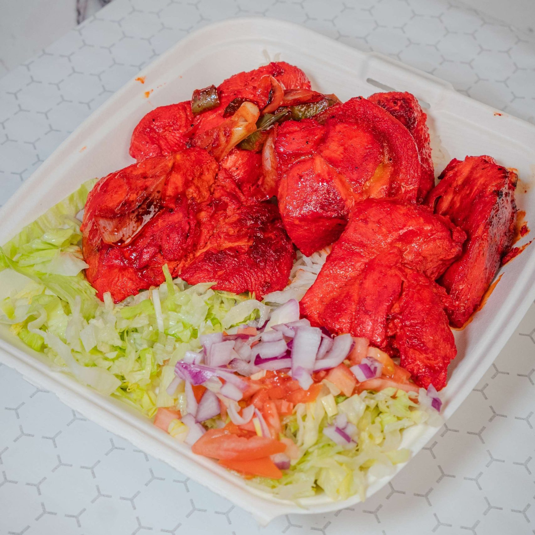 chicken tikka over rice
